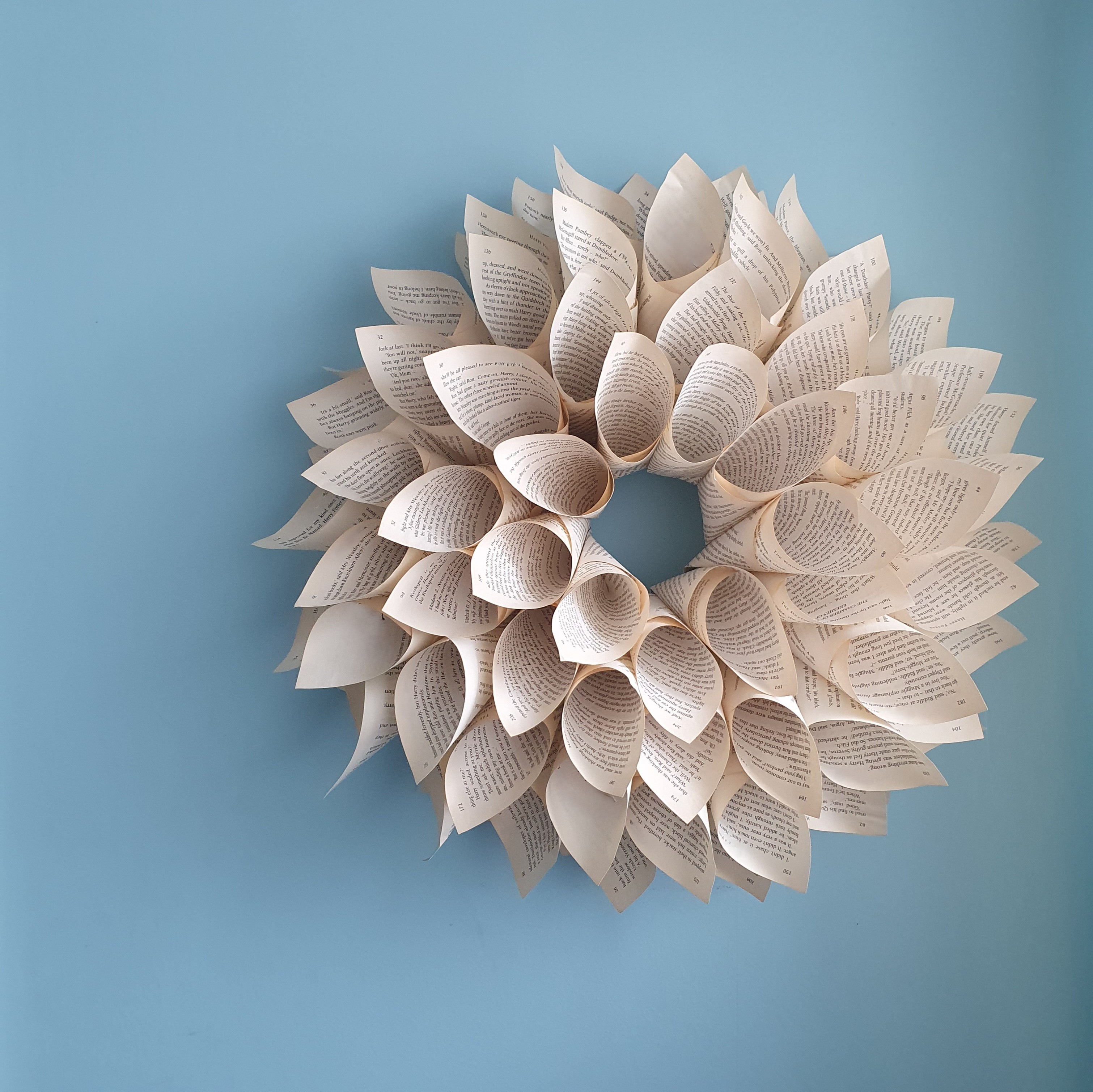 A beautiful wreath made from cones of folded book pages